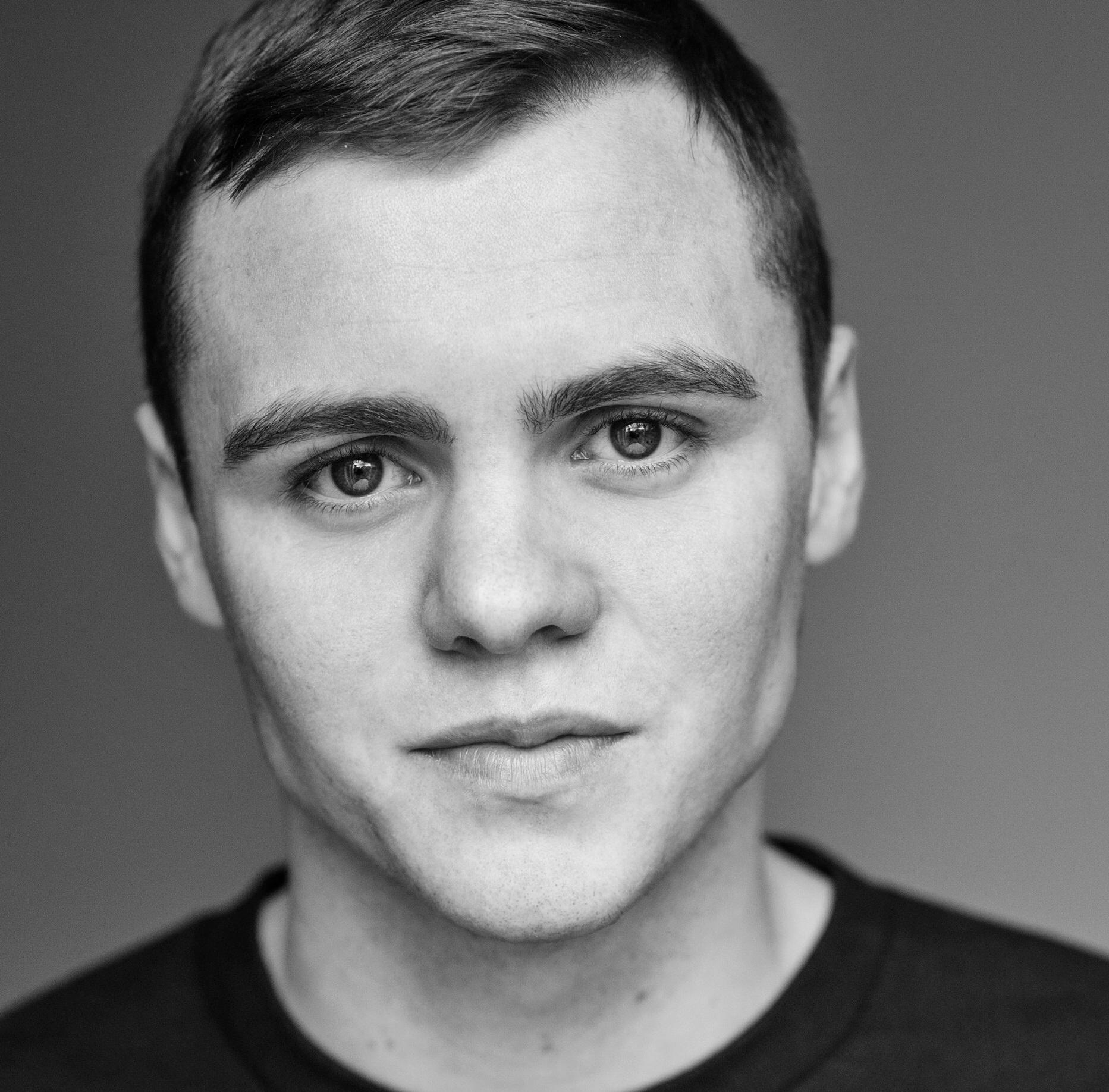Black and white headshot of Aled Ap Steffan