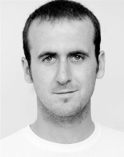 Black and white headshot of Kieran Bailey