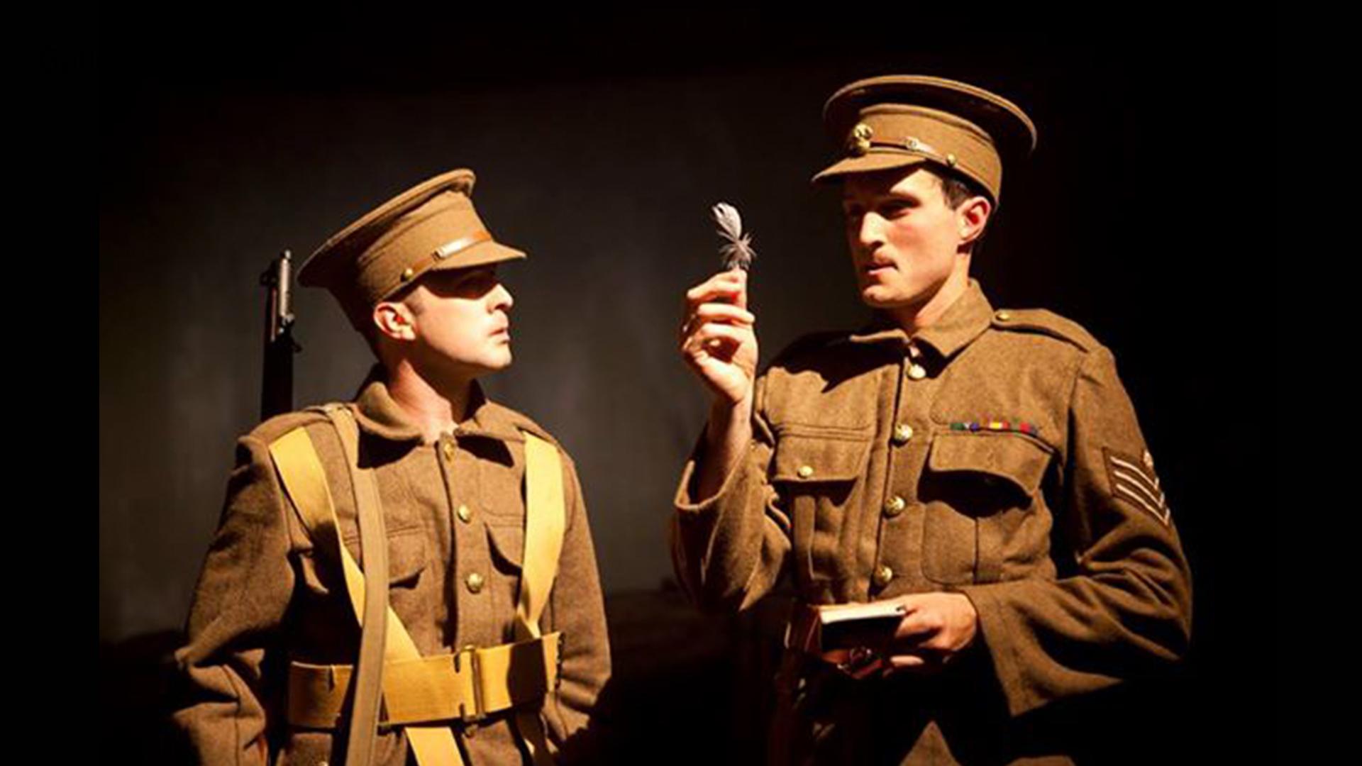 Two World War 1 British soldiers, one holding a white feather