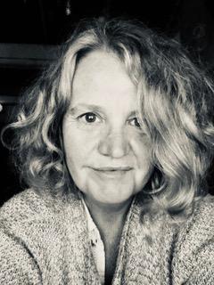 White woman with short grey hair