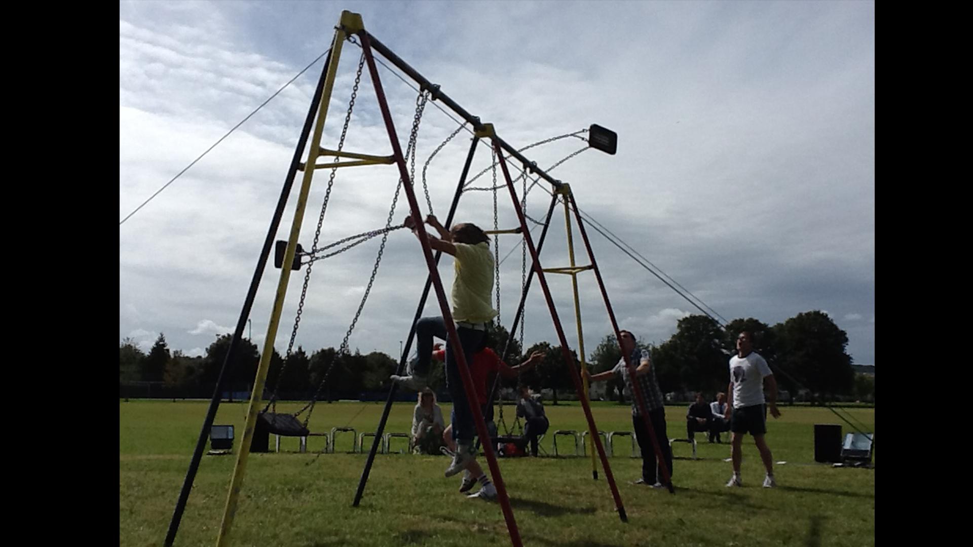 People on swings